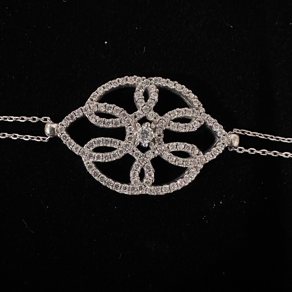 Intricate Silver Bracelet with Ornate Centerpiece